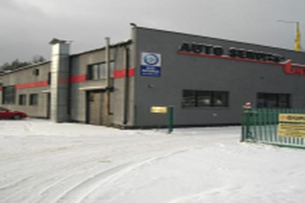 Warsztat Auto Serwis Test w zimowej scenerii